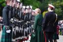 The Duchess of Edinburgh inspects the guard of honour (Andrew Milligan/PA)