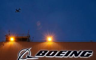 Boeing shareholders approve chief’s compensation as company faces investigations (Ted S Warren, AP)