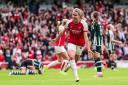 Arsenal's Cloe Lacasse celebrates scoring their third goal against Manchester United. Picture: RHIANNA CHADWICK/PA
