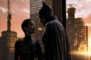 Zoë Kravitz as Selina Kyle and Robert Pattinson as Batman and in Warner Bros Pictures’ The Batman