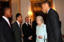 Britain's Queen Elizabeth II meets Arsenal football team members (left to right); Justin Hoyte, Theo Walcott, Freddie Ljungberg and captain Thierry Henry (right) at Buckingham Palace.