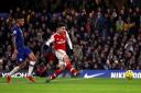 Arsenals Gabriel Martinelli scores his side's first goal of the game during the Premier League match at Stamford Bridge, London. Picture: Bradley Collyer/PA