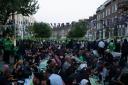People break fast at Finsbury Park Mosque street iftar. Picture: Joshua Thurston