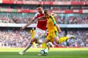 Arsenal's Carl Jenkinson (left) and Crystal Palace's Max Meyer battle for the ball (pic Bradley Collyer/PA)