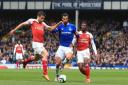Everton's Andre Gomes (centre) battles for the ball with Arsenal's Sokratis Papastathopoulos (left) and Ainsley Maitland-Niles