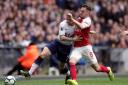 Tottenham Hotspur's Kieran Trippier (left) and Arsenal's Aaron Ramsey battle for the ball during the Premier League match at Wembley Stadium, London.PA