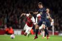 Arsenal's Pierre-Emerick Aubameyang (left) and Manchester United's Ander Herrera battle for the ball (pic John Walton/PA)
