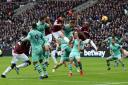 West Ham United's Declan Rice has a headed chance on goal during the Premier League match at London Stadium. PA