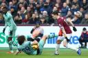 West Ham United's Declan Rice (right) and Arsenal's Matteo Guendouzi battle for the ball during the Premier League match at London Stadium. PA