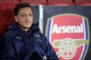 Arsenal's Mesut Ozil on the bench at the Emirates Stadium during a Europa League match (pic Nick Potts/PA)