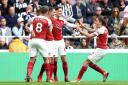 Arsenal's Granit Xhaka (centre) celebrates scoring his side's first goal of the game with team mates during the Premier League match at St James' Park, Newcastle (pic Owen Humphreys/PA)