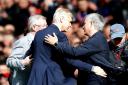Arsenal manager Arsene Wenger (centre) with Manchester United manager Jose Mourinho (right) and Sir Alex Ferguson (left) before the Premier League match at Old Trafford (pic Martin Rickett/PA)
