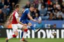 Leicester City's Jamie Vardy has a shot on goal during the Premier League match at the King Power Stadium, Leicester.