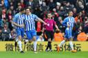 Brighton & Hove Albion's Lewis Dunk (second left) celebrates scoring his side's first goal (pic Gareth Fuller/PA)