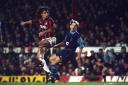 ARSENAL'S PAUL MERSON BACK IN THE ACTION AGAINST AC MILAN'S PAOLO MALDINI (L) DURING THE SUPERCUP MATCH AT HIGHBURY.