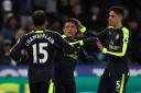 Arsenal's Alexis Sanchez (centre) celebrates scoring his side's fourth goal of the game during the Premier League match at the Liberty Stadium, Swansea.