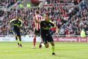 Arsenal's Alexis Sanchez celebrates scoring his side's first goal of the game during the Premier League match at the Stadium of Light, Sunderland.