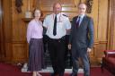 Paul Hobbs, London Fire Brigade's borough commander for Islington, centre, is greeted by Islington Council chief executive Lesley Seary and leader Richard Watts.