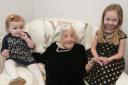 Doris Smart celebrates her 100th birthday with great-great-granddaughters Violet, 18 months, and Olivia, five. Picture: Nigel Sutton