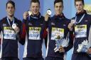 Britain's silver medal winners (L-R) Chris Walker-Hebborn, Adam Peaty, James Guy and Duncan Scott with their medals. Picture: AP PHOTO