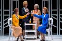 A scene from Handbagged by Moira Buffini at Kiln Theatre: Abigail Cruttenden (Liz), Kate Fahy (T), Marion Bailey (Q), Naomi Frederick (Mags).
