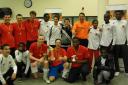 Cup Champions, Bloomberg, with tournament organisers from the ReachOut! Academy project.
