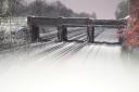 Snow covering the rail tracks for the London Underground lines in Willesden Green