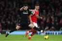 Declan Rice challenges Granit Xhaka during Arsenal's clash with West Ham United last season