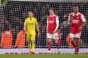 Arsenal's Aaron Ramsdale and Rob Holding look dejected