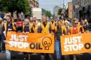 Activists 'slow marched' down Holloway Road earlier today
