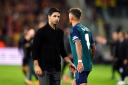 Mikel Arteta looks dejected after Champions League defeat in France