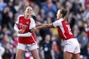 Arsenal goalscorers Alessia Russo and Katie McCabe celebrate