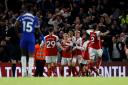 Arsenal celebrate Leandro Trossard's equaliser at Chelsea