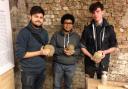 Teacher Joshua Alford and pupils Raul Simmons-Perez, 16, and Nico Zavrou Blackstock, 16, from East Barnet School, Barnet, with their clay figures. Picture: Erica Spurrier/Equity