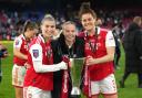 Arsenal's Steph Catley, Beth Mead and Jen Beattie celebrate with the Conti Cup