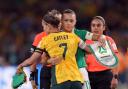 Arsenal teammates Steph Catley and Katie McCabe hug before the match between Australia and the Republic of Ireland