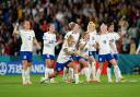 England players celebrate during their penalty shoot-out with Nigeria