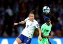 England's Lucy Bronze competes for a header against Nigeria