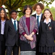 Headteacher Belinda Chapple with Caterham High School pupils
