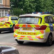 Police and ambulance service cars in the Elthorne Estate on June 2
