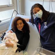 New mum Cherelle with baby Valentina and her midwife Nikola at the Whittington