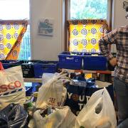 VIc Mason amongst some of the donations for Muswell Hill Foodbank