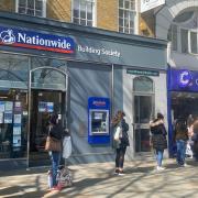 Queues outside the Cancer Research UK shop in Angel as non-essential shops reopened on April 12