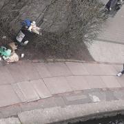 Overflowing litter bin beside Regent’s Canal