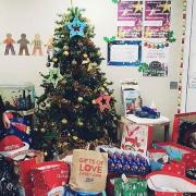 Brooke and Amy Cooper gave bags of presents to Muriel Street care home.