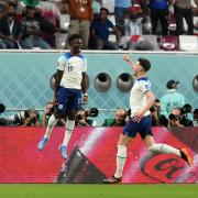 Bukayo Saka celebrates scoring England's second goal against Iran at the World Cup