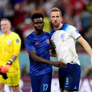 Bukayo Saka congratulates Harry Kane after England's win over Wales