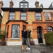 Kevin Johnson and his wife Dee celebrate winning the Omaze £3 million house near Finsbury Park station