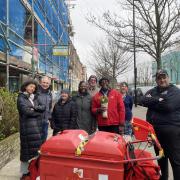 Residents pay tribute to postman Dave Whyte, who has worked in Drayton Park for 49 years