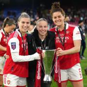 Arsenal's Steph Catley, Beth Mead and Jen Beattie celebrate with the Conti Cup